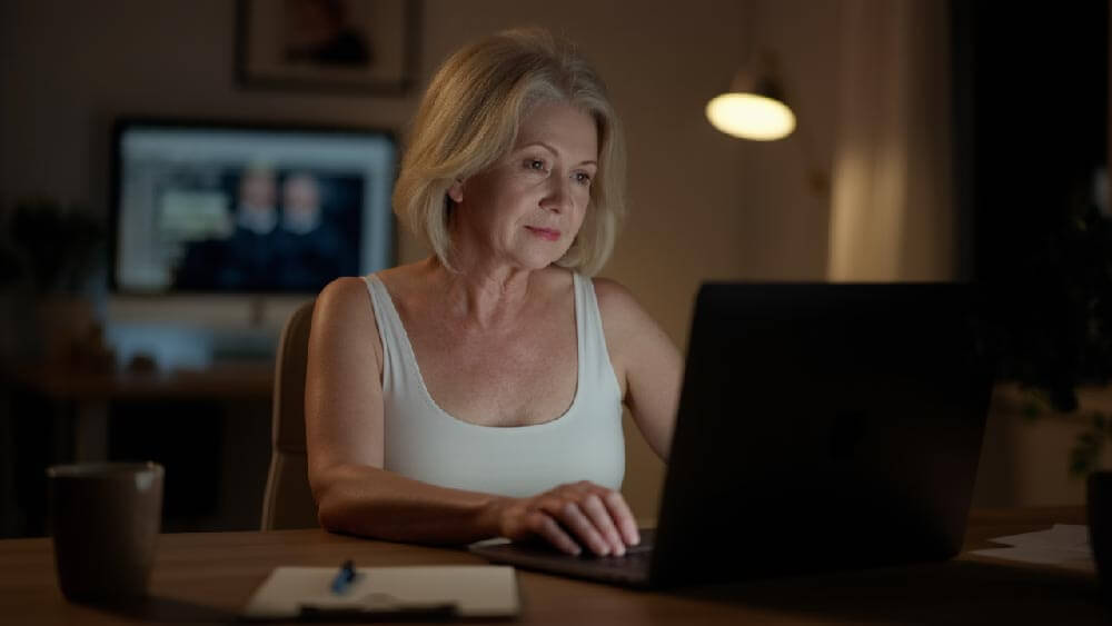 A retiree modifying his savings strategy after using a retirement calculator