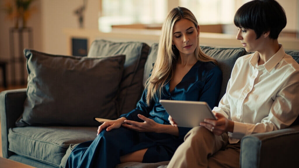 A retired couple discussing Social Security tax strategies with a professional advisor