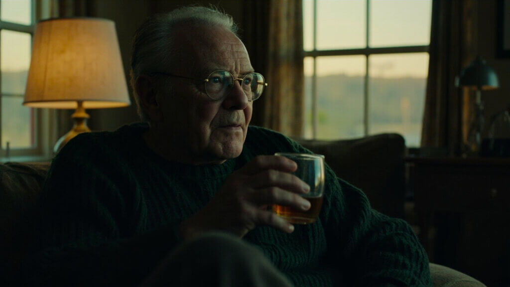 Senior man looking pensive and withdrawn while sitting alone